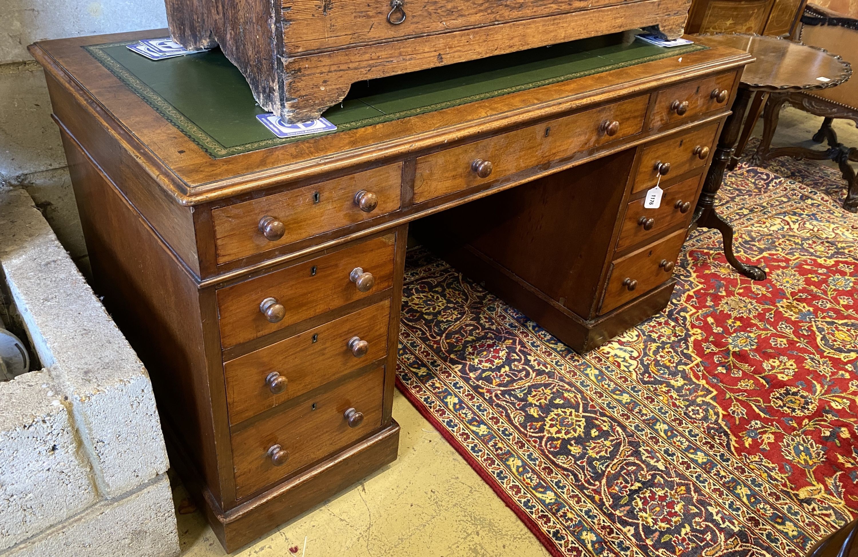 A Victorian mahogany pedestal desk, length 138cm, depth 71cm, height 75cm